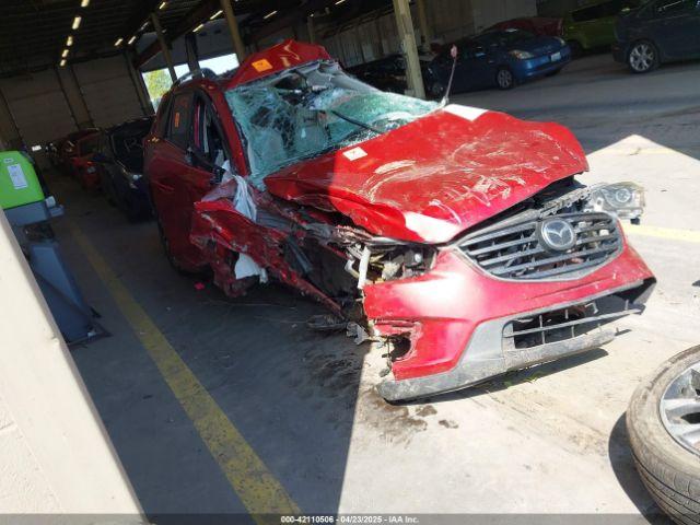  Salvage Mazda Cx