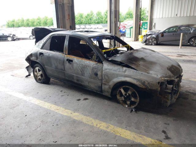  Salvage Mazda Protege