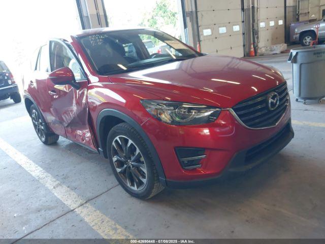  Salvage Mazda Cx