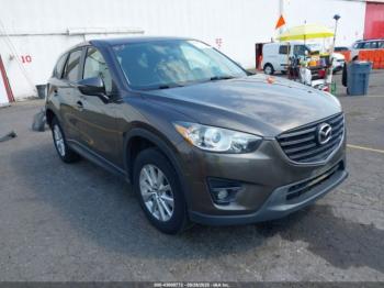  Salvage Mazda Cx