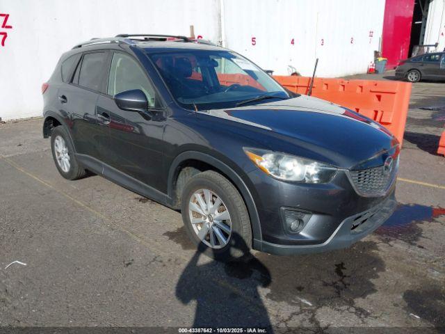  Salvage Mazda Cx